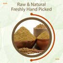 Raw and freshly hand-picked Coriander Powder piled in traditional clay and wooden bowls alongside whole coriander seeds, highlighting the natural seed-to-powder journey.
