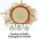 Top-down view of a round terracotta clay bowl filled with fine pale beige Shatavari root powder, surrounded by scattered dry Asparagus racemosus root sticks on a white background, displaying three green circular badges for Vegan, 100% Organic, and Gluten Free certifications, captioned "Product of India." Packaged in Canada."